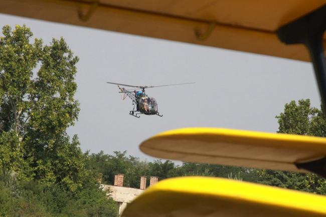 Elkezdődött a parlagfüves területek helikopteres felderíté Székesfehérvár, 2014. augusztus 13. Helikopter indul a parlagfűvel szennyezett területek felderítésére a Székesfehérvár közelében lévő börgöndpusztai repülőtérről 2014. augusztus 13-án. Elkezdődött a parlagfüves területek helikopteres felderítése. A Fejér Megyei Kormányhivatal Növény-és Talajvédelmi igazgatóságának szakemberei a helikopteres felderítéssel két nap alatt tudják ellenőrizni az egész megyét. MTI Fotó: Nagy Lajos